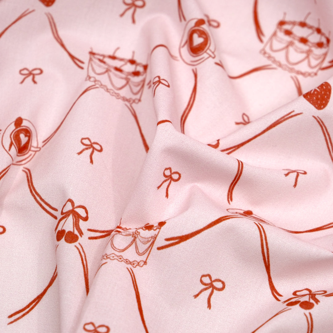 Live Laugh Cake Lightweight Cotton Lawn - Pale Pink/Crimson | Blackbird Fabrics