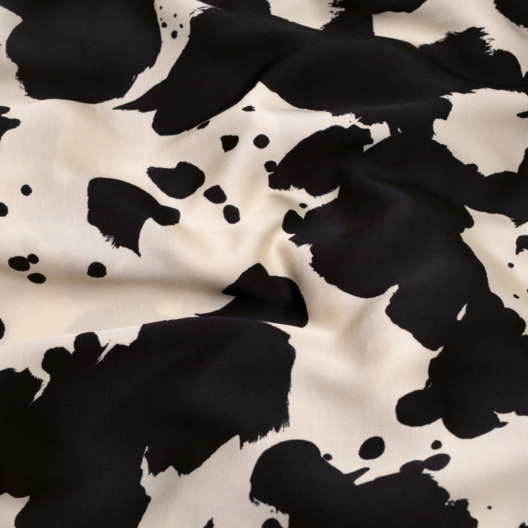 Inky Spots Viscose Satin - Ivory/Black | Blackbird Fabrics