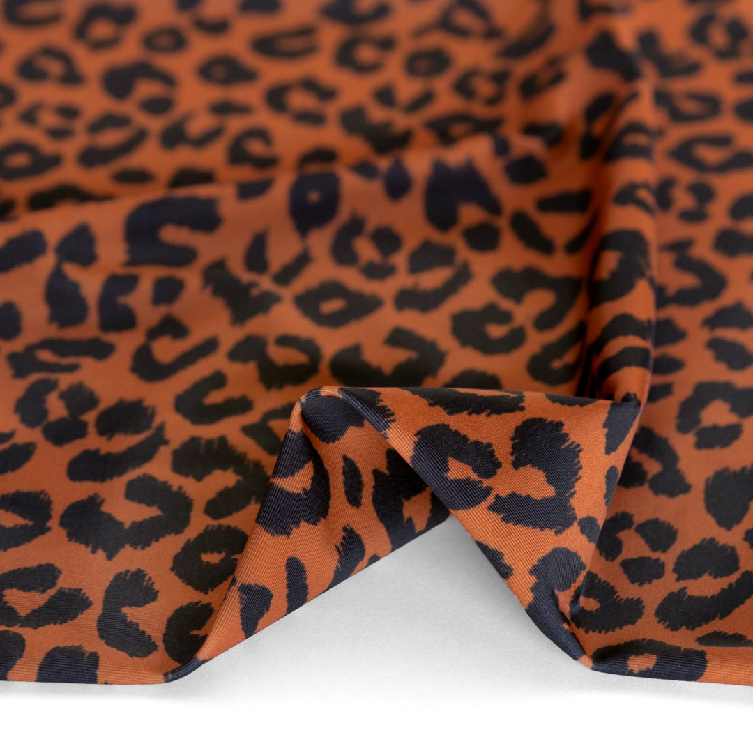 Leopard Printed Recycled Poly Swim Tricot - Rust/Black | Blackbird Fabrics