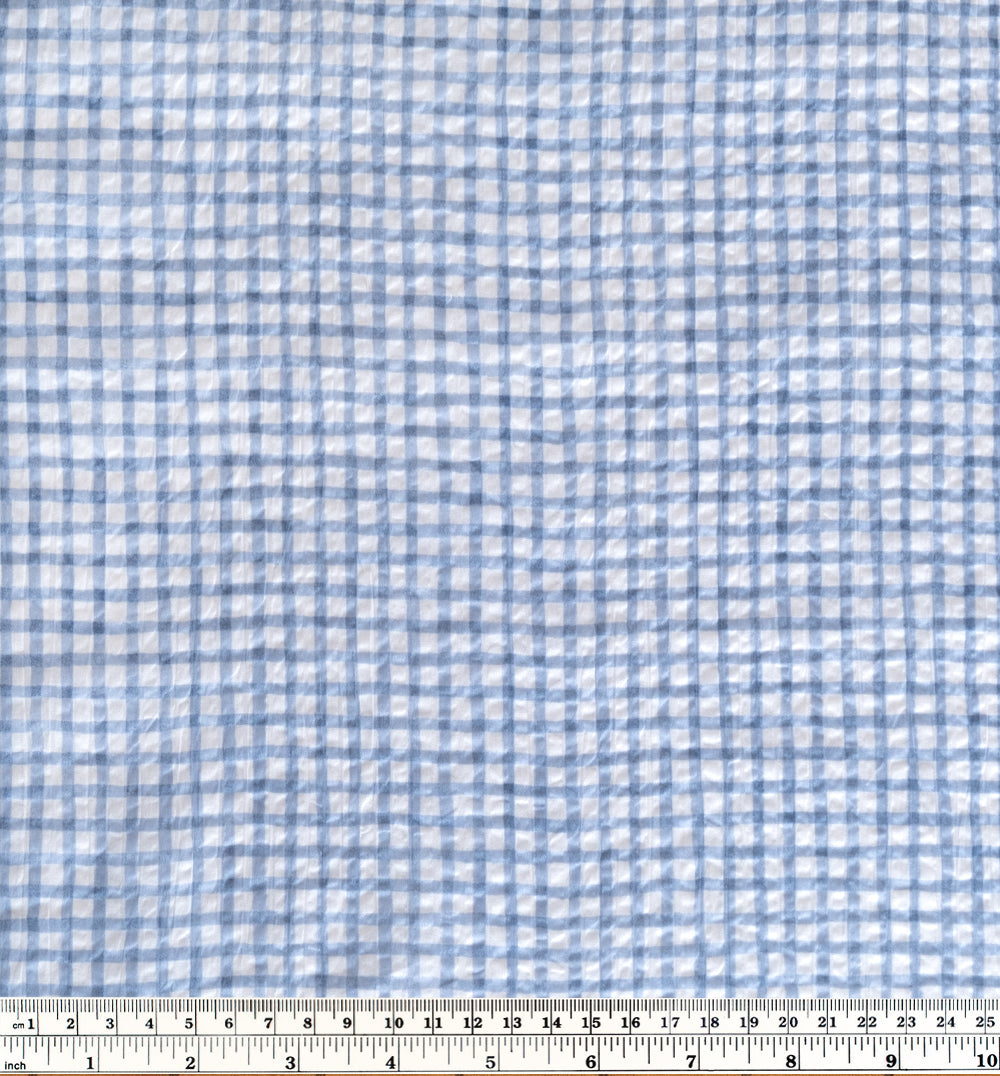Natural fiber crinkled seersucker cotton in baby blue and white check grid print