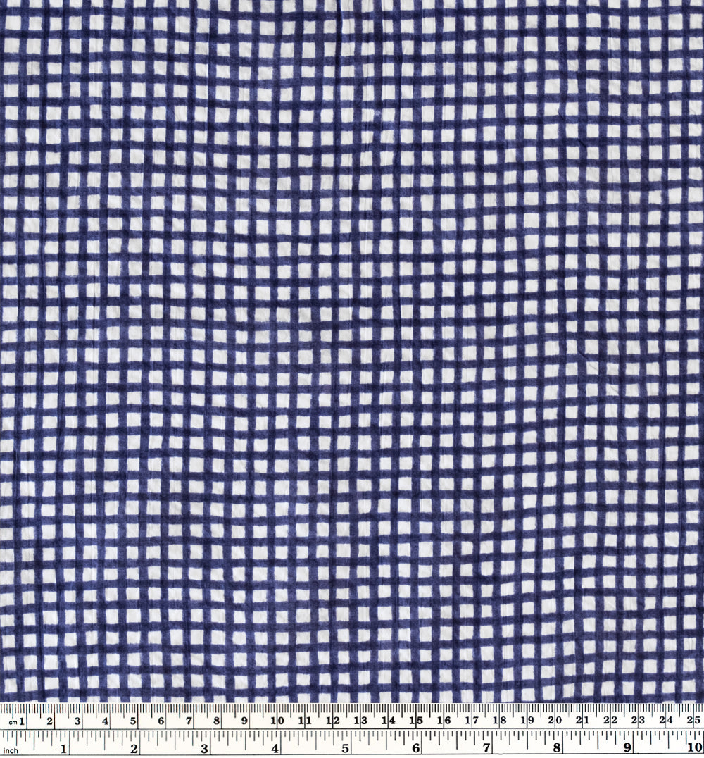 Natural fiber crinkled seersucker cotton in navy and white check grid print