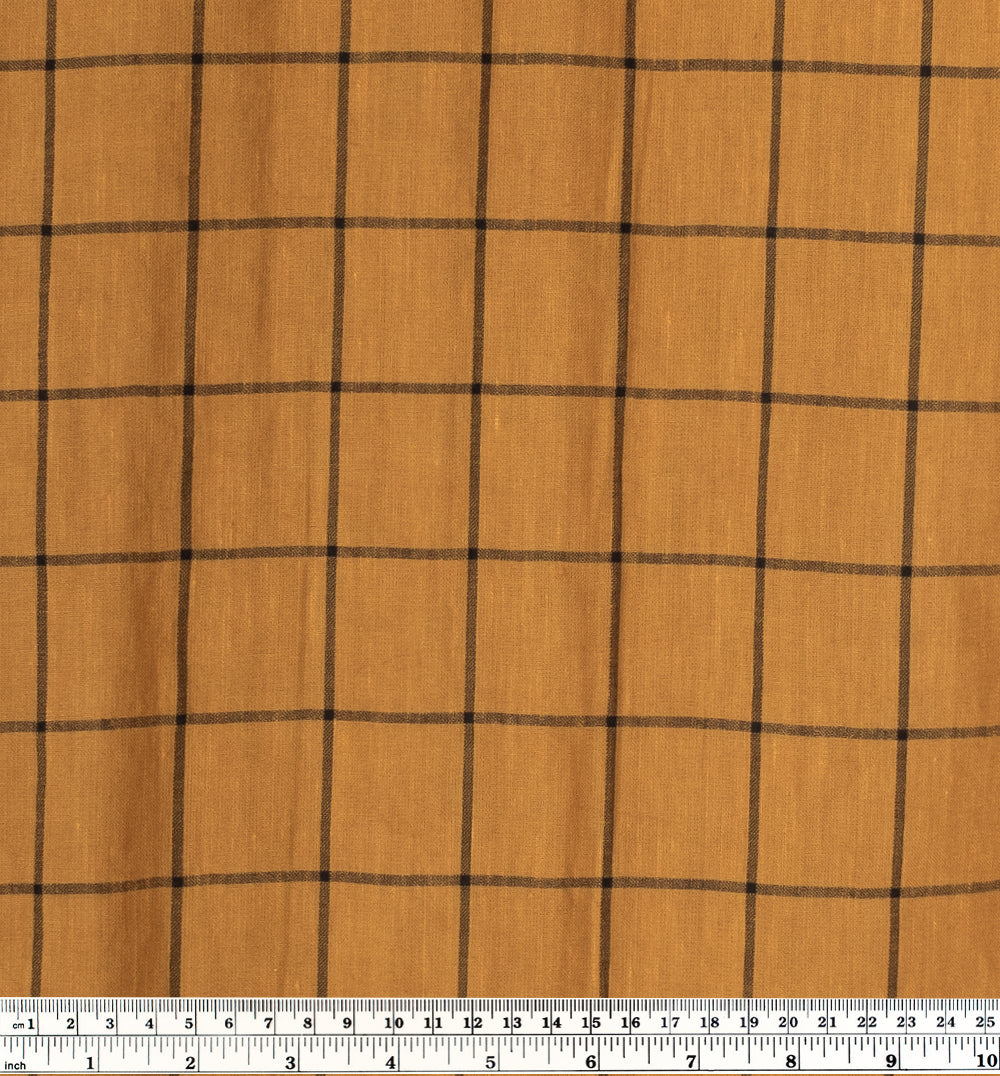 Lyocell and linen blend woven fabric in Caramel brown with black windowpane check yarn dyed design