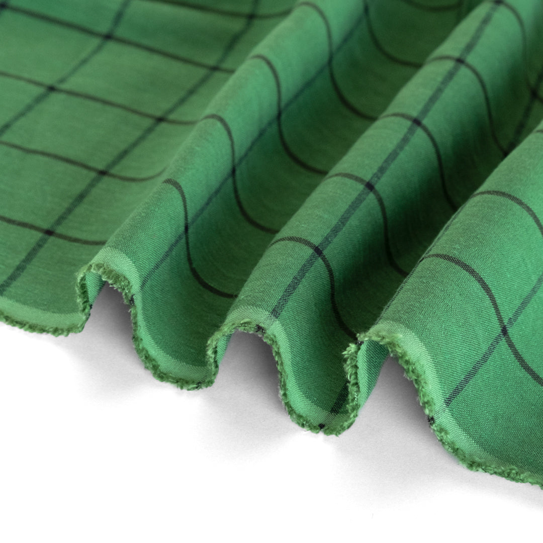 Lyocell and linen blend woven fabric with yarn dyed windowpane check design in Emerald Green